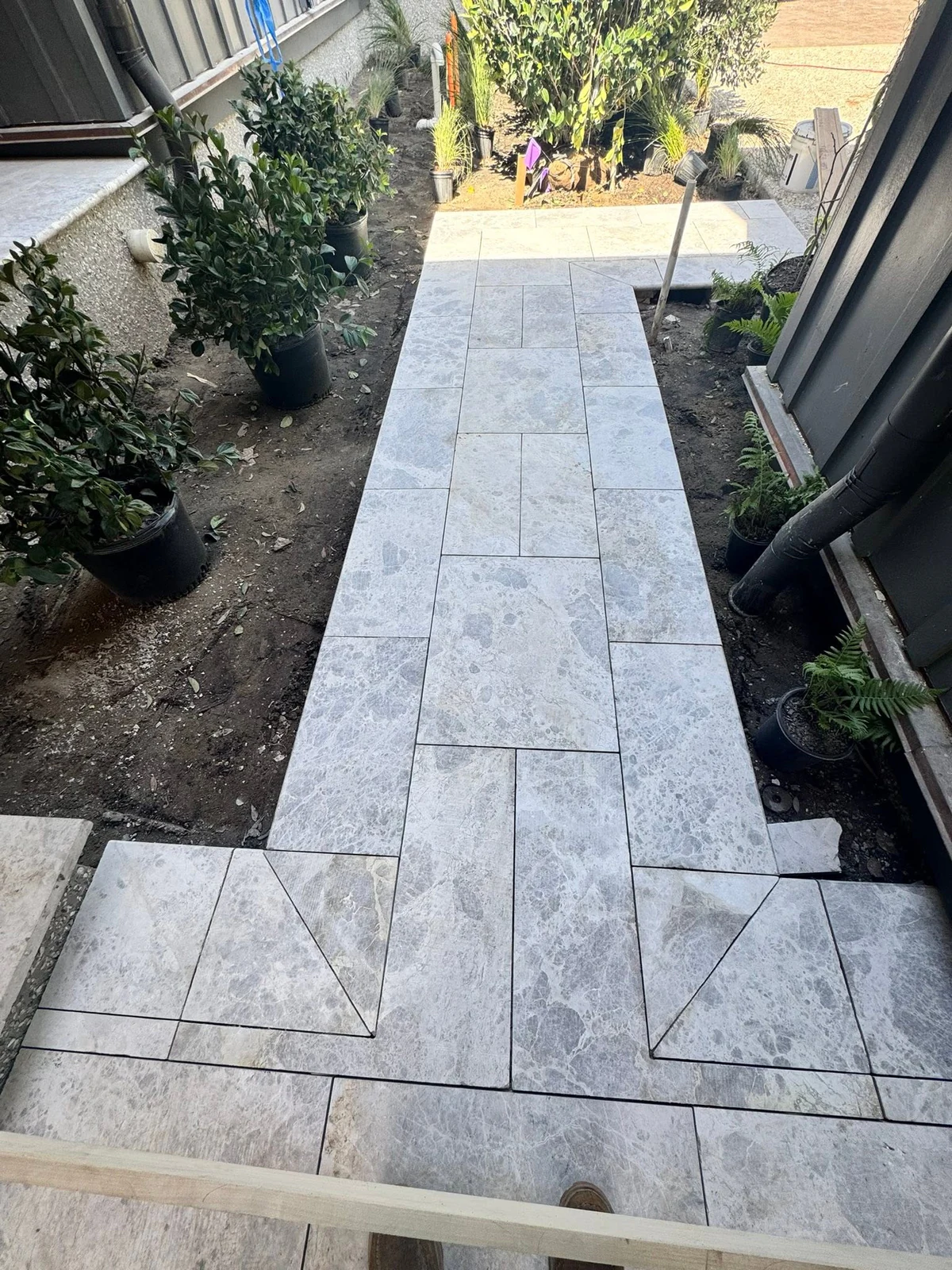 Sidewalk and outdoor floor renovation by Paez And More